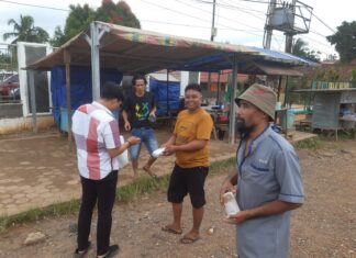 Ambil Berkah Ramadhan IMBA Bagikan Nasi ke Tukang Ojek untuk Berbuka Puasa